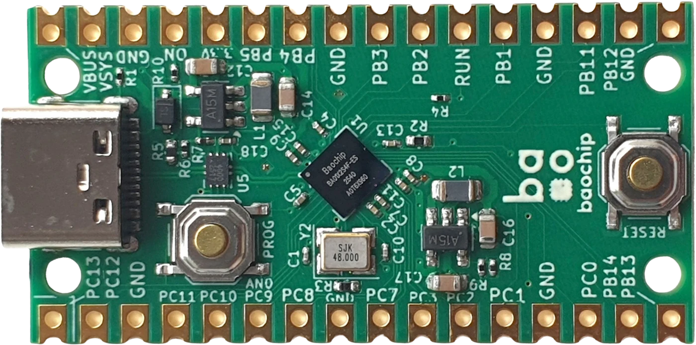 Baochip 1x development board showing the BAO0294F-ES SoC, USB C connector and broken out PB, PC and PA pin headers